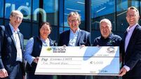 Agri-food business presents cheque to Laois based charity Embrace FARM