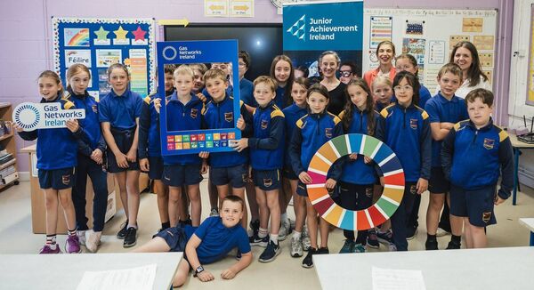 Sixth class pupils from Scoil Naomh Eoin, Killenard pictured alongside their classmates Andrew and Mateo who won the nationwide poster competition.