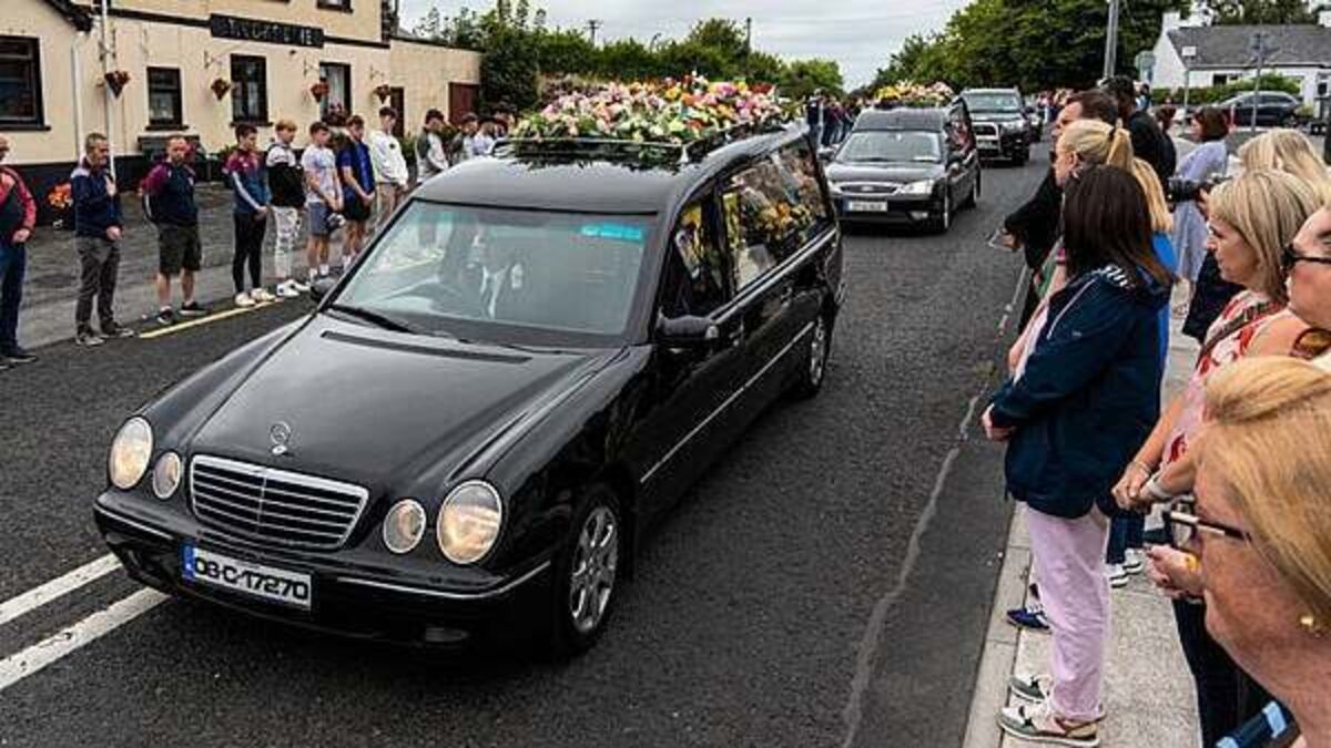 Murdered mother and children ‘together and finally safe’ – funeral hears