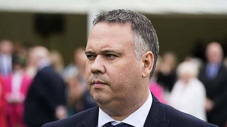 Two men charged in connection with attempted murder of PSNI detective John Caldwell