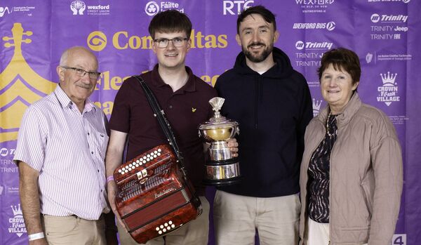 Noel Stapleton from the Craobh Seán Ryan branch of CCÉ in Kilcavan is pictured with his family after winning first place in the over-18 category of the button accordion at this year’s Fleadh in Wexford.