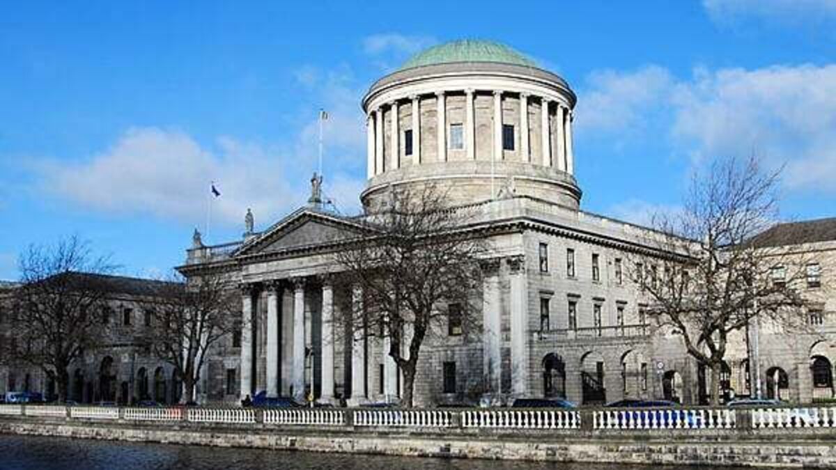 Kerry farmer tearfully hugs wife as they succeed in blocking sale of his land by bank