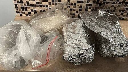 Two men (40s) arrested after drugs and cash seized in Dublin