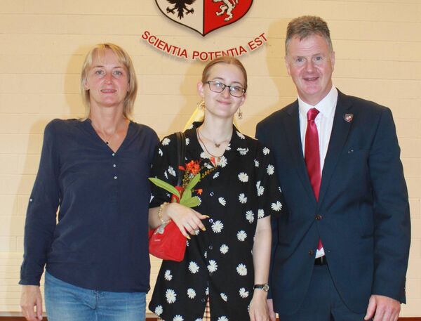 Agata Zymula who collected her leaving cert results at Portlaoise College is pictured alongside her mother Marta and College Principal Noel Mr Daly