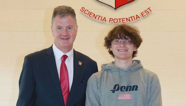 Scott Duffy, who was the inaugural Mary McAleese Ozanam Scholarship winner at Portlaoise College, is pictured with College Principal Noel Daly on leaving cert results day.