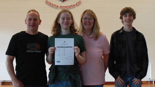 <p>Amy Kennedy with her parents Christine and David and brother Ethan who were pictured in Portlaoise College after she received her leaving cert results</p>