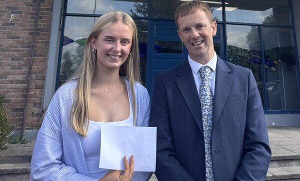 Student Lucy Donohue displaying her leaving cert result paper alongside Heywood Community School Principal Eamon Jackman Student Lucy Donohue displaying her leaving cert result paper alongside Heywood Community School Principal Eamon Jackman