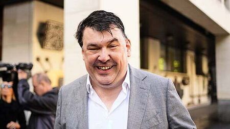 Father Ted creator Linehan arrives at court for trans activist harassment trial