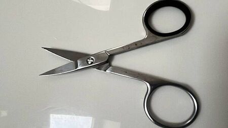 Judge overturns jail term for woman who had nail scissors in handbag