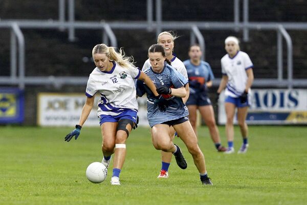 St Conleth's Naomi Luttrell and Ballyroan's Aine Carter vie for possession of this ball Photo: David Maher St Conleth's Naomi Luttrell and Ballyroan's Aine Carter vie for possession of this ball Photo: David Maher