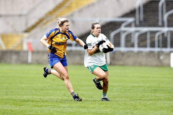 Portlaoise's Ellen Healy protects the ball as Becky Williams (Sarfields) moves in on her Photo: David Maher Portlaoise's Ellen Healy protects the ball as Becky Williams (Sarfields) moves in on her Photo: David Maher