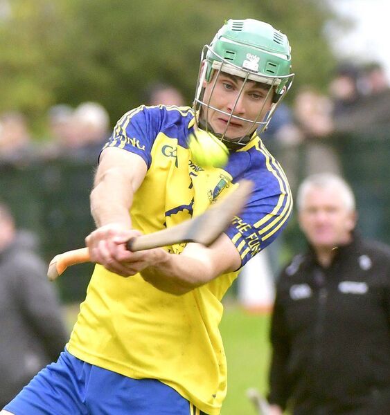 Ciaran Byrne (Abbeyleix) playing for a score against Portlaoise Photo: Denis Byrne Ciaran Byrne (Abbeyleix) playing for a score against Portlaoise Photo: Denis Byrne