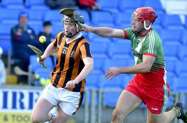 Ashton Keenan (Camross) on the attack with Enda Parlon (Borris/Kilcotton) sticking at this shoulder Photo: Denis Byrne