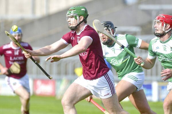 Ryan Quinlan (Ballinakill) controls this sliotar in the SHC quarter-final win over Rosenallis Photo: Denis Byrne