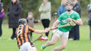 <p>Ballyfin's Ronan Carroll makes room for himself as he heads for the Camross goal in their PIHC semi-final win Photo: Paul Dargan</p>