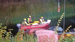 <p>Firefighters at the scene near Vicarstown last night. Photo:: Laois County Fire and Rescue Service</p>