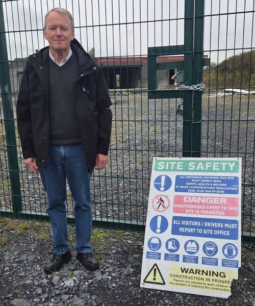 Deputy Brian Stanley pictured outside the partly developed school in Fruithill, Graiguecullen.