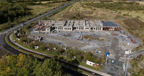 Half-built special needs school in Laois has bushes and weeds growing around it