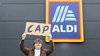 Lewis Cap-Aldi surprises shoppers with gig on supermarket roof