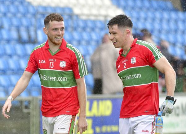 Ross Hennessy and Sean McGrath happy with a job well done after beating Killeshin in thew SFC quarter-final 	Photo: Denis Byrne
