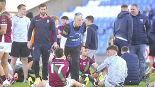 <p>Manager Pat Roe shows his appreciation to the Portarlington players for their performance against Arles Killeen on Saturday 	Photo: Denis Byrne</p>