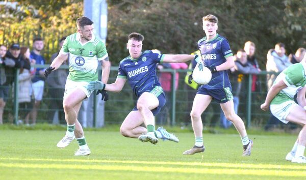 Conor Goode (Stradbally) intercepts this passed ball in the SFC 'B' semi-final against Rosenallis at the LOETB Centre of Excellence Photo: Denis Byrne