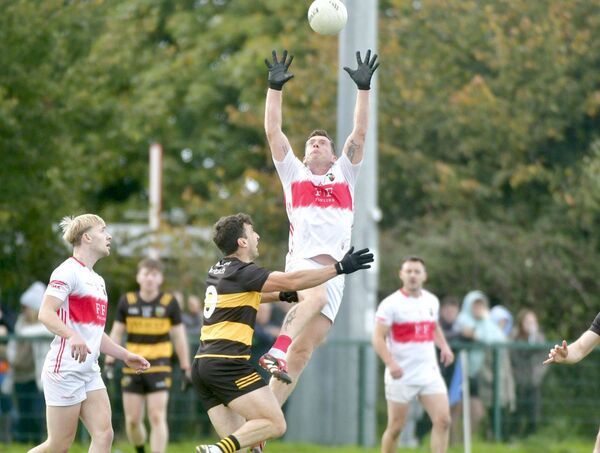 Darren Strong (Emo) rises to secure this ball in their SFC 'B' semi-final win over The Heath Photo: Denis Byrne