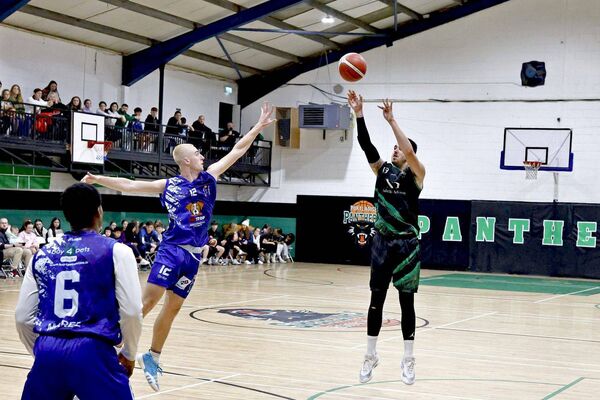 Portlaoise Panthers' Xabi Arriaga goes for a basket against Maree Photo: Denis Maher