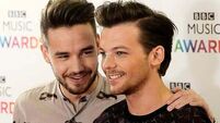 Louis Tomlinson says bandmate Niall Horan told him of Liam Payne’s death