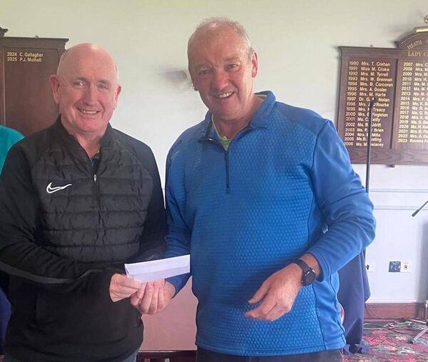 Winner on the day, Dominic Connell receives his prize from Society Captain, Philip Monnelly Winner on the day, Dominic Connell receives his prize from Society Captain, Philip Monnelly