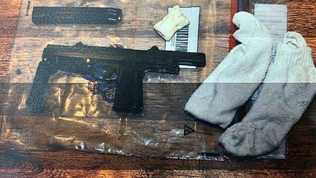 Man who terrorised and bit ex-girlfriend during burglary had machine gun in his home, court told