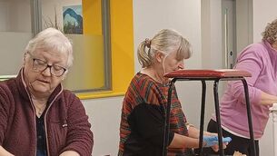 <p>Hard at work during the upcycling workshop in Portlaoise</p>