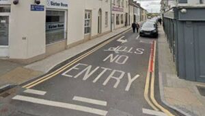 Woman knocked off bicycle on busy Laois road