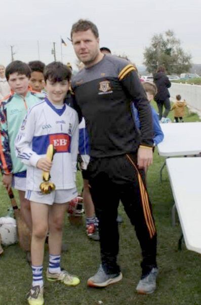 Castletown receiving their medals from Tadgh Doran Castletown receiving their medals from Tadgh Doran