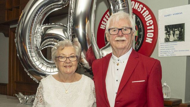 <p>Bridget and John Bambrick cutting their Diamond Wedding Anniversary (60 years) cake </p>