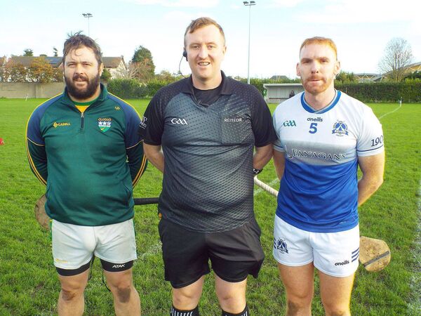 Clonad captain James Farrell with his Kevin's HC counterpart, Cathal Minogue and referee: Ciaran Flynn prior to throw-in Clonad captain James Farrell with his Kevin's HC counterpart, Cathal Minogue and referee: Ciaran Flynn prior to throw-in