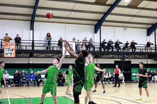 Love Omijade gets a shot away against Rathmore Ravens Photo David Maher Love Omijade gets a shot away against Rathmore Ravens Photo David Maher