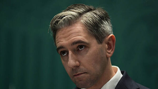 Woman in court accused of sending threatening messages to Tánaiste Simon Harris