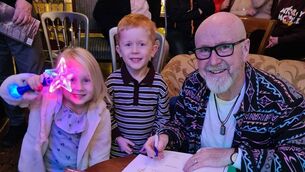 <p>Author John Whelan with his proud grandchildren at the Preston House launch</p>