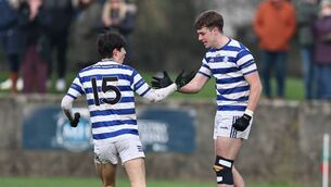 <p>Kncokbeg's Adam Farrell congratulates Ennae Byrne on scoring his early second half goal</p> <p>Kncokbeg's Adam Farrell congratulates Ennae Byrne on scoring his early second half goal</p>