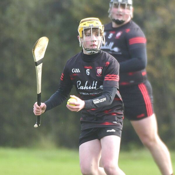 Andrew Larkin (Portlaoise CBS) checks his options before playing this sliotar on Friday Photo: Denis Byrne Andrew Larkin (Portlaoise CBS) checks his options before playing this sliotar on Friday Photo: Denis Byrne