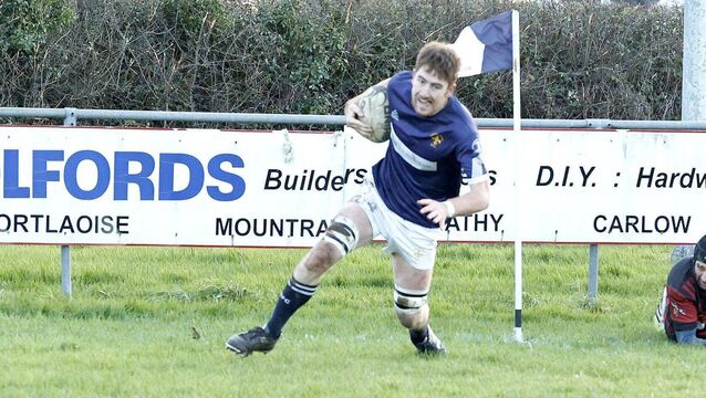 <p>Portlaoise's Michael Rigney goes in for his second try in the defeat Leinster League Division2B/3 defeat of Arklow in Togher on Sunday Photo: David Maher</p>