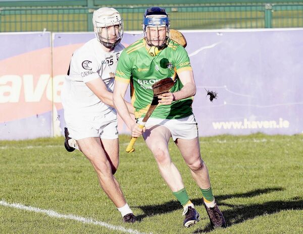 Clonad's David O'Brien breaks as Clane's Shane Henry gives chase Clonad's David O'Brien breaks as Clane's Shane Henry gives chase
