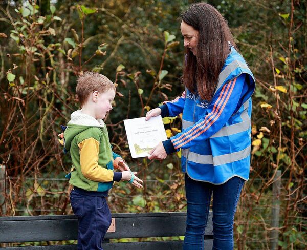 One young participant receives a certificate after completing the Camross Community Park junior parkrun Photo: Thomas Flinkow/Sportsfile One young participant receives a certificate after completing the Camross Community Park junior parkrun Photo: Thomas Flinkow/Sportsfile