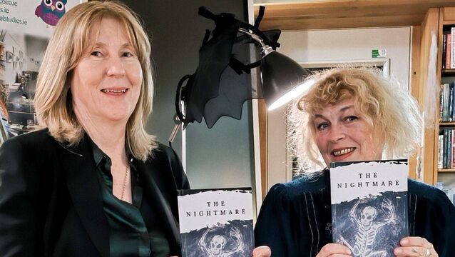 <p>Abbeyleix Library staff member Martina O'Connor and author of The Nightmare F B Hogan </p>