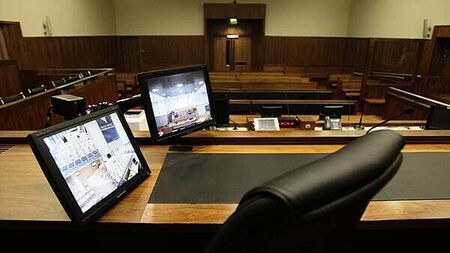 'Vulnerable' mother caught with firearms arsenal 'secreted' under stairs gets four years