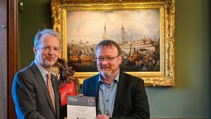 <p>Simon Barrowcliff, Prime Warden of the Fishmongers Company 2025 – 2026 presents Alan Mitchell, owner of Al’s Fish Shop in Portarlington with his Advanced Fishmonger Certification</p>