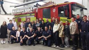 <p>Firefighters and their families at the family appreciation night in Portarlington Fire Station. Photo: Laois County Fire and Rescue Service</p>
