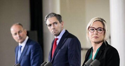 ‘Pantomime’ erupts in Dáil as Simon Harris holds up graphic of Michelle O’Neill