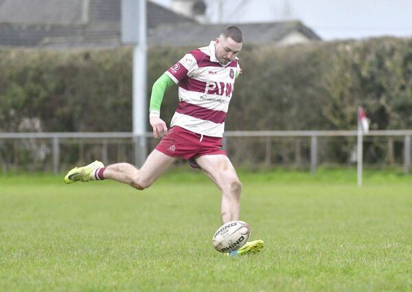 Andrew Evans (Portarlington) converting with this kick against Roscrea on Sunday Photo: Denis Byrne
